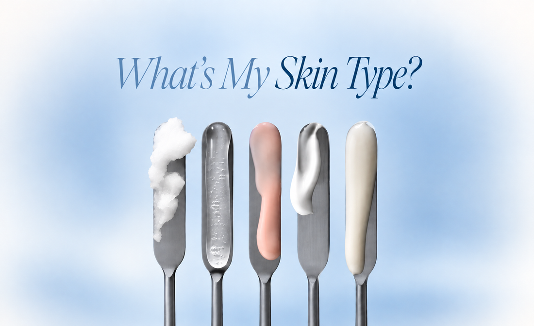 Five metal skincare spatulas displaying different product textures, including cream, clear gel, pink lotion, and white moisturizer, against a soft blue background with the text “What’s My Skin Type?”