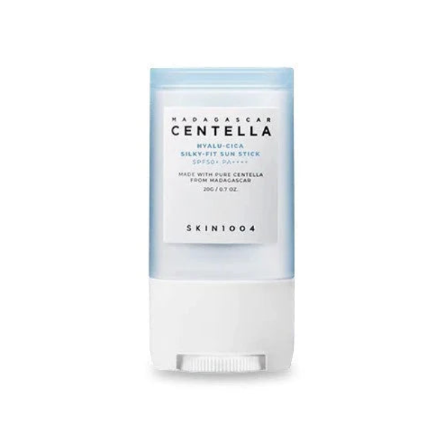 A single skincare product, SKIN1004 Madagascar Centella Hyalu-Cica Silky-Fit Sun Stick, in a translucent light blue and white squeeze tube with a white cap, shown on a plain white background.