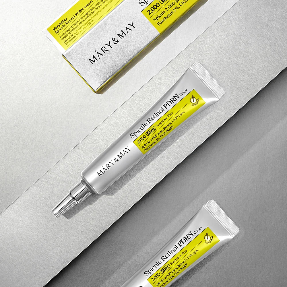 Mary&May Spicule Retinol PDRN Cream on a gray surface