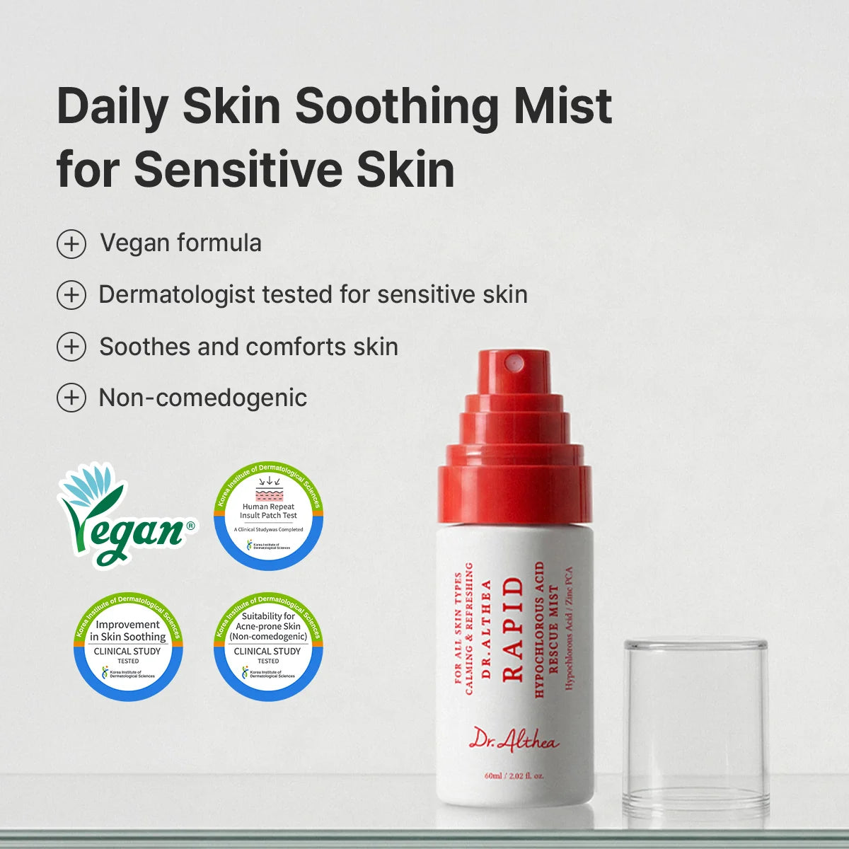 Dr. Althea Rapid Hypochlorous Acid Rescue Mist for sensitive skin, shown with its red spray cap removed and a clear glass bottle on a light gray background with product benefits and certification badges.