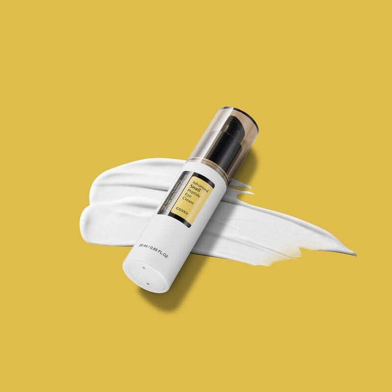 COSRX Advanced Snail Peptide Eye Cream on a yellow background
