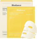 Biodance Radiant Vita Niacinamide Real Deep Mask packaging with a white mask on a yellow background.