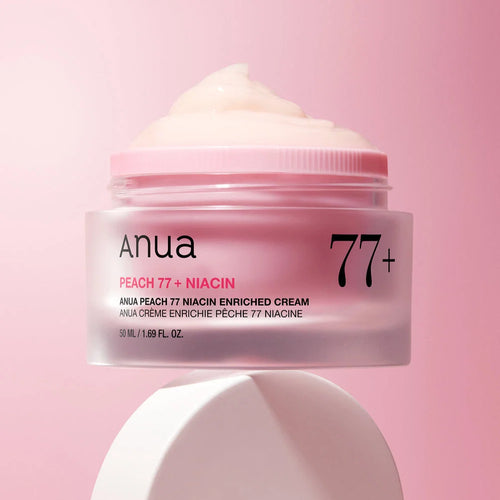 Anua Peach 77 Niacin Enriched Creamjar on a pink background