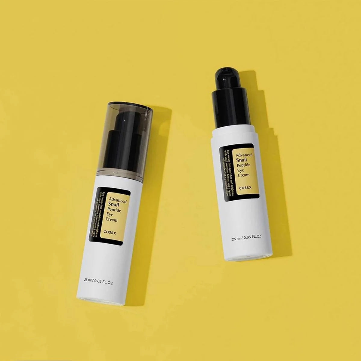2 COSRX Advanced Snail Peptide Eye Cream on a yellow background