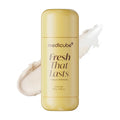 Medicube Fresh That Lasts deodorant stick in a pale yellow container, shown against a white background with a cream swipe behind it.