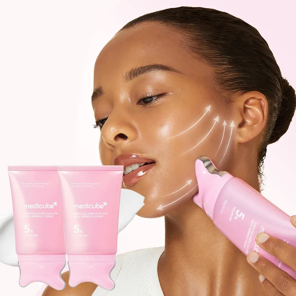 A woman applies a pink Medicube PDRN Collagen Gua Sha Neck Wrinkle Cream and a handheld applicator onto her face, with white arrows illustrating absorption. Two pinkMedicube PDRN Collagen Gua Sha Neck Wrinkle Cream are shown in the lower left against a light pink background.