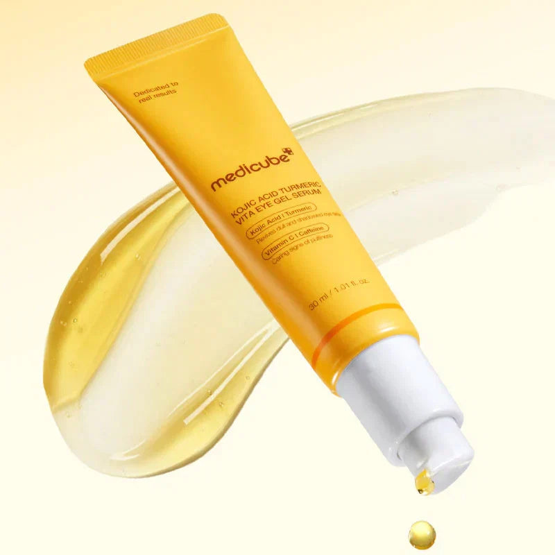 medicube eye cream kojic acid with dropper on a light yellow background