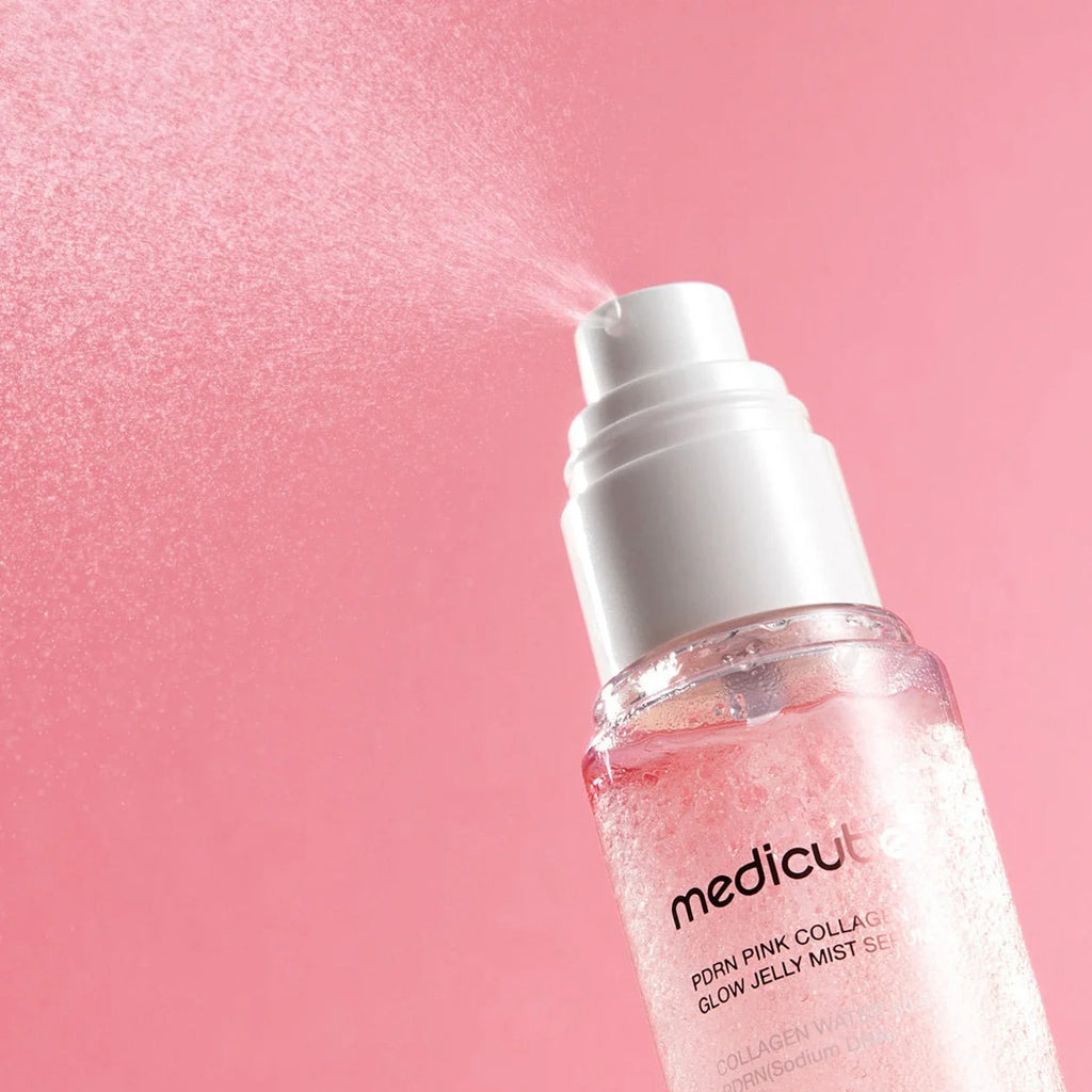 Medicube PDRN Pink Collagen Glow Jelly Mist Serum on a pink background