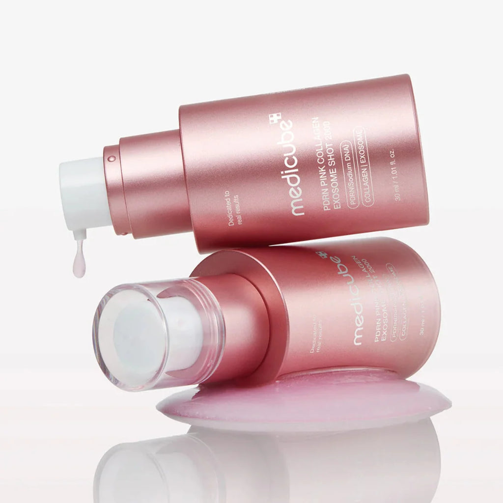 Two Medicube PDRN Pink Collagen Exosome Shot Serum 2000 30ml on a white background