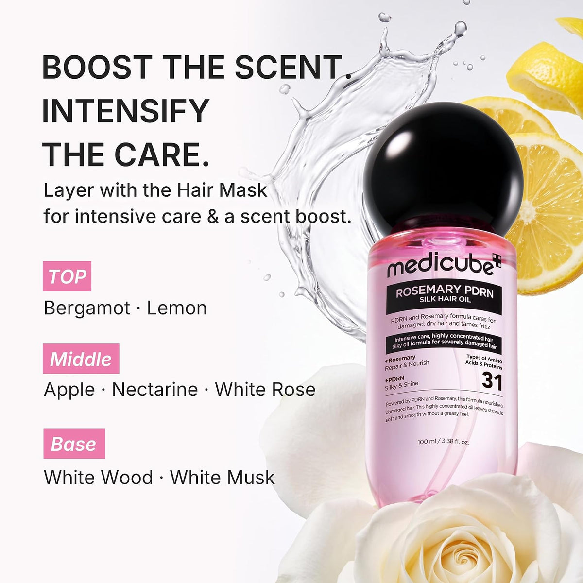 Medicube Rosemary PORN Silk Hair Oil bottle with a black cap and pink liquid, surrounded by white roses and lemon slices on a white background with promotional text.