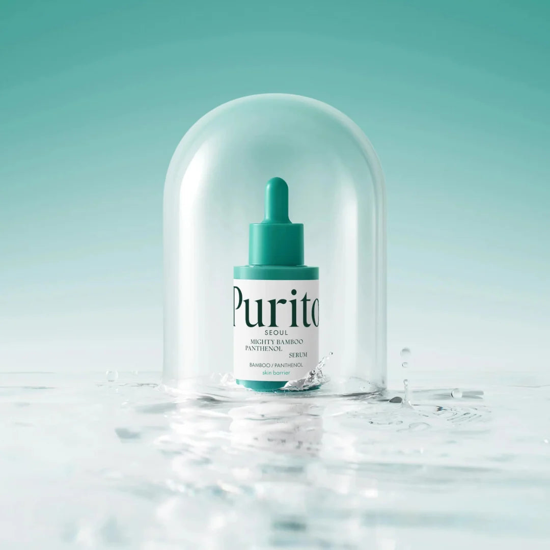 Putiyo Mighty Bamboo Panthenol Serum in a white bottle with a teal dropper cap, enclosed in a clear glass dome over a reflective water surface against a teal gradient background.