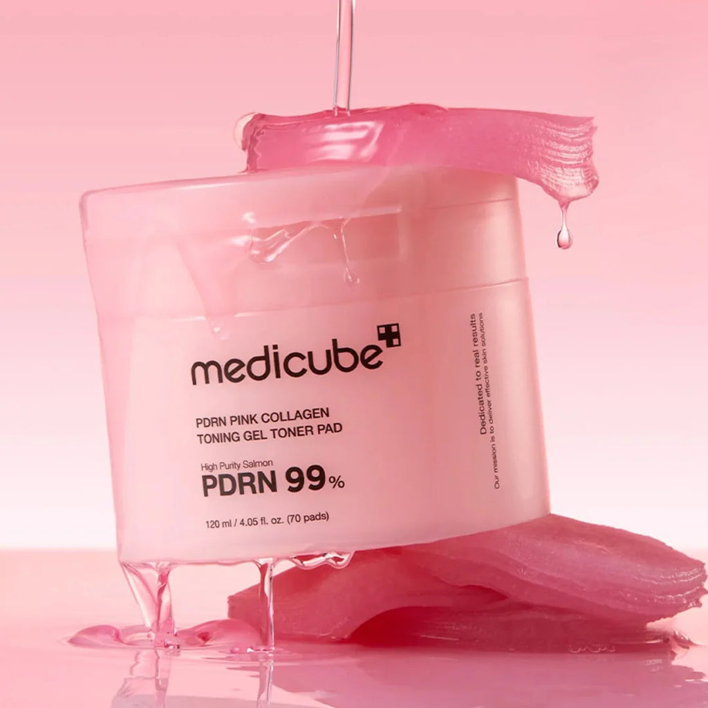 Pink gel toner pad with 'medicube' branding on a pink background