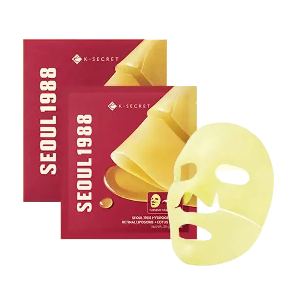 Two K-SECRET Seoul 1988 Retinal Liposome + Lotus Flower Hydrogel Mask packets with one pale yellow mask placed in front on a white background.
