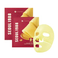 Two K-SECRET Seoul 1988 Retinal Liposome + Lotus Flower Hydrogel Mask packets with one pale yellow mask placed in front on a white background.