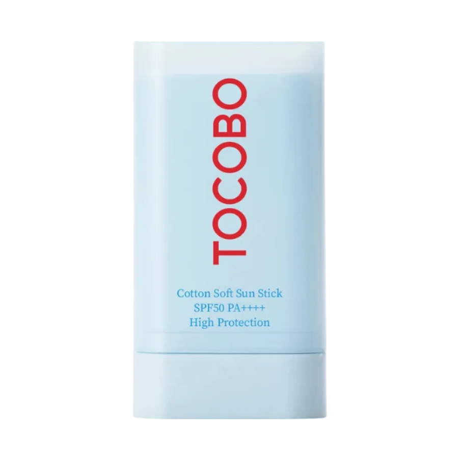 A light blue cylindrical sunscreen stick container with the brand name 'TOCOBO' printed vertically in red, and product details in blue text, shown on a plain white background.