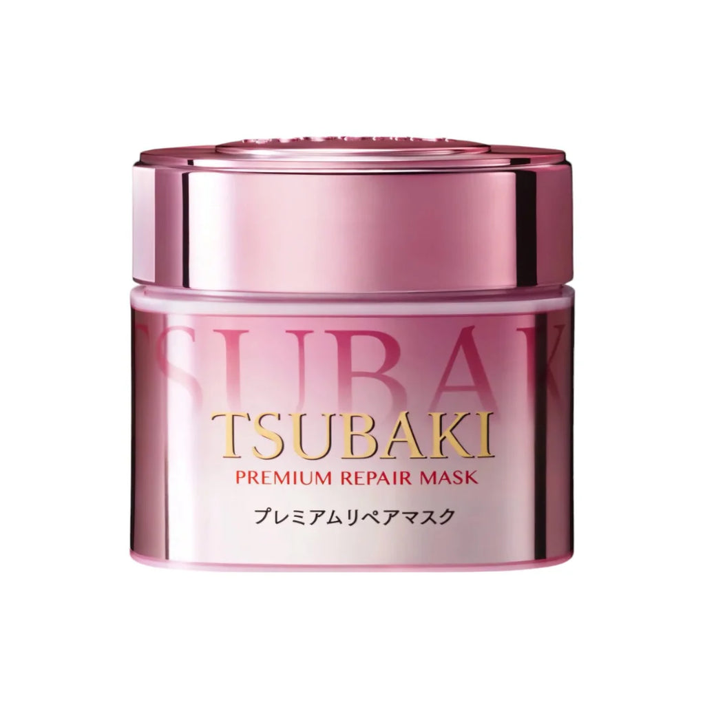 Tsubaki Premium Repair Hair Mask Pink Camellia in a metallic pink jar with gold lettering, shown on a plain white background.