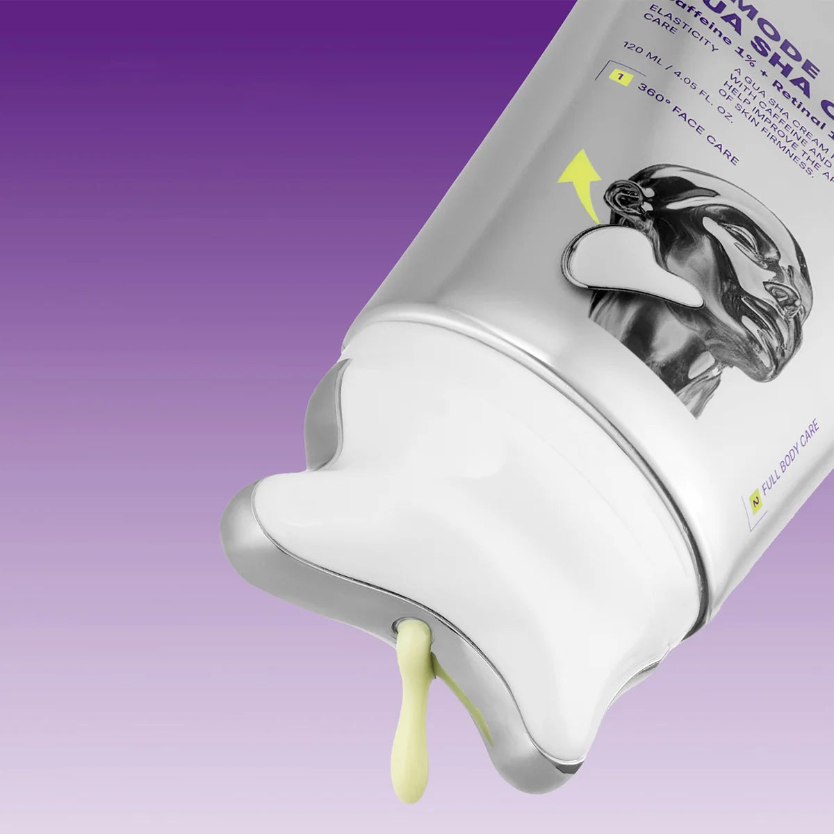 VT V-Mode Gua Sha Cream with a few yellow cream on a purple background