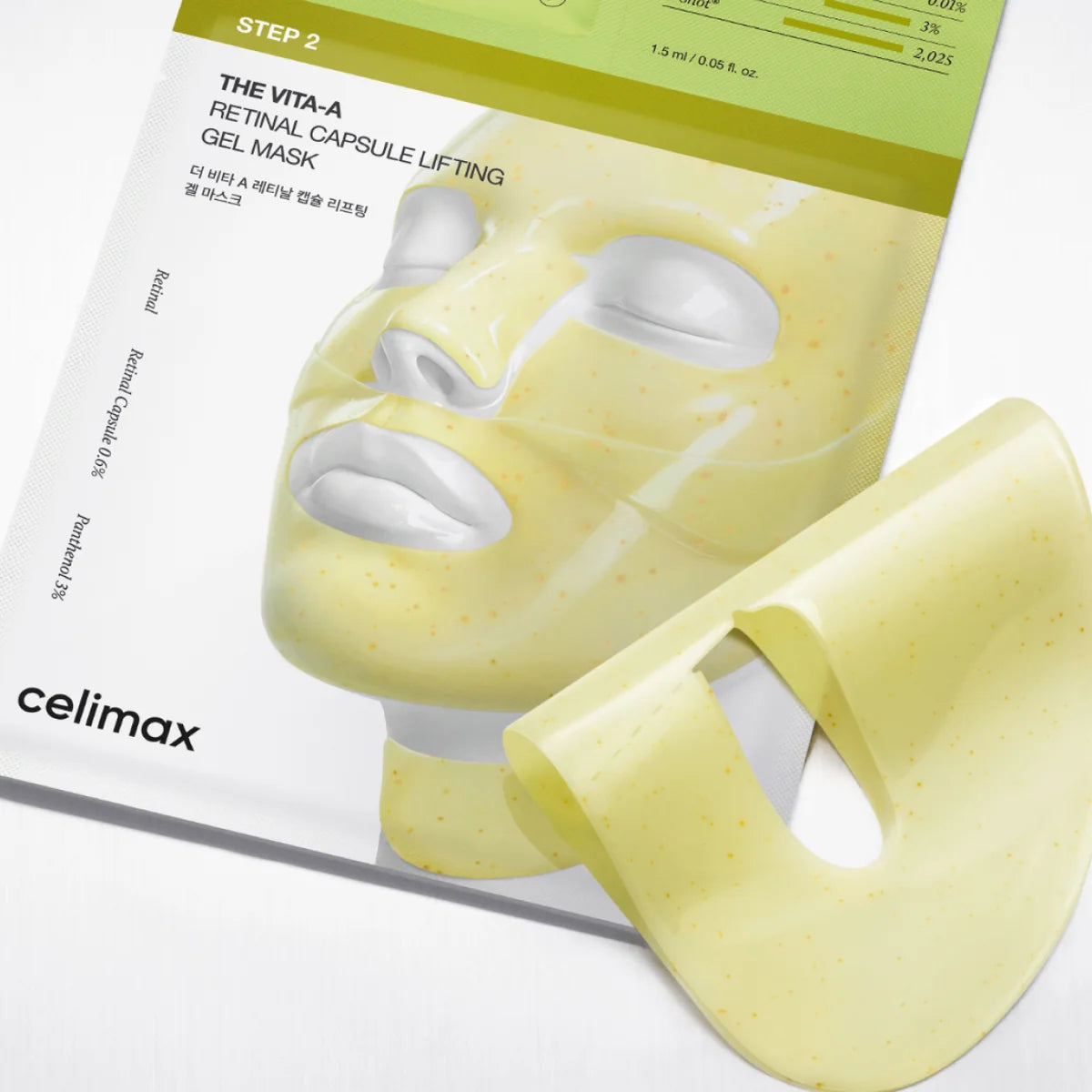 A Celimax The Vita-A Retinol Shot Tightening 2-Step Gel Mask shown with its retail box. The mask itself is pale yellow with tiny speckles, and the box features a large illustration of the mask on a white background with a light green top section.