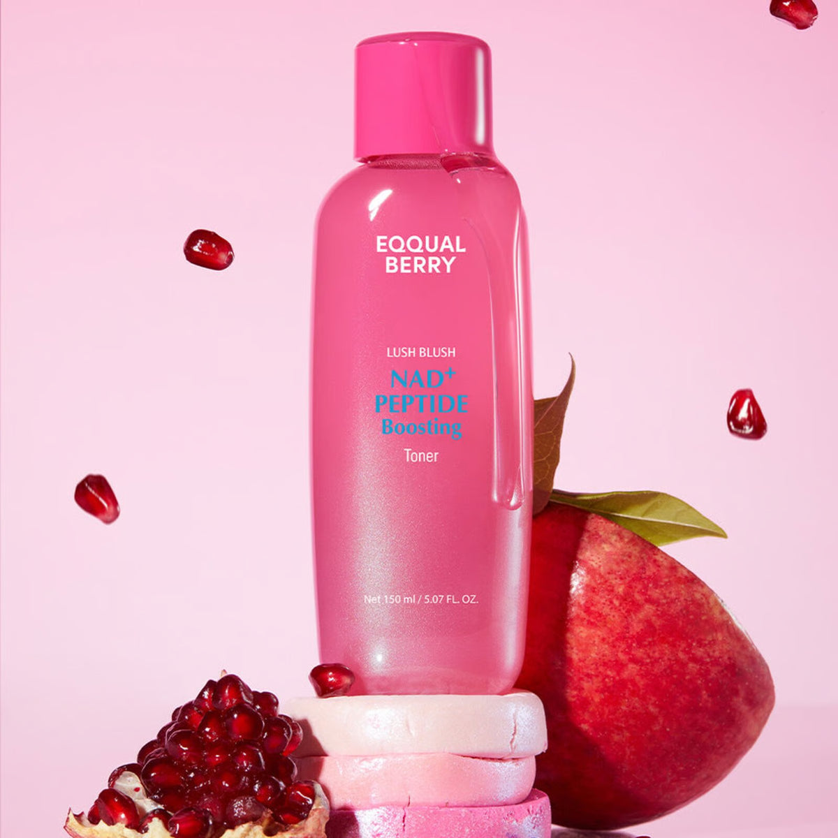 EQQUALBERRY Nad+ Peptide Boosting Toner 150 ml with pomegranate and apple on a pink background