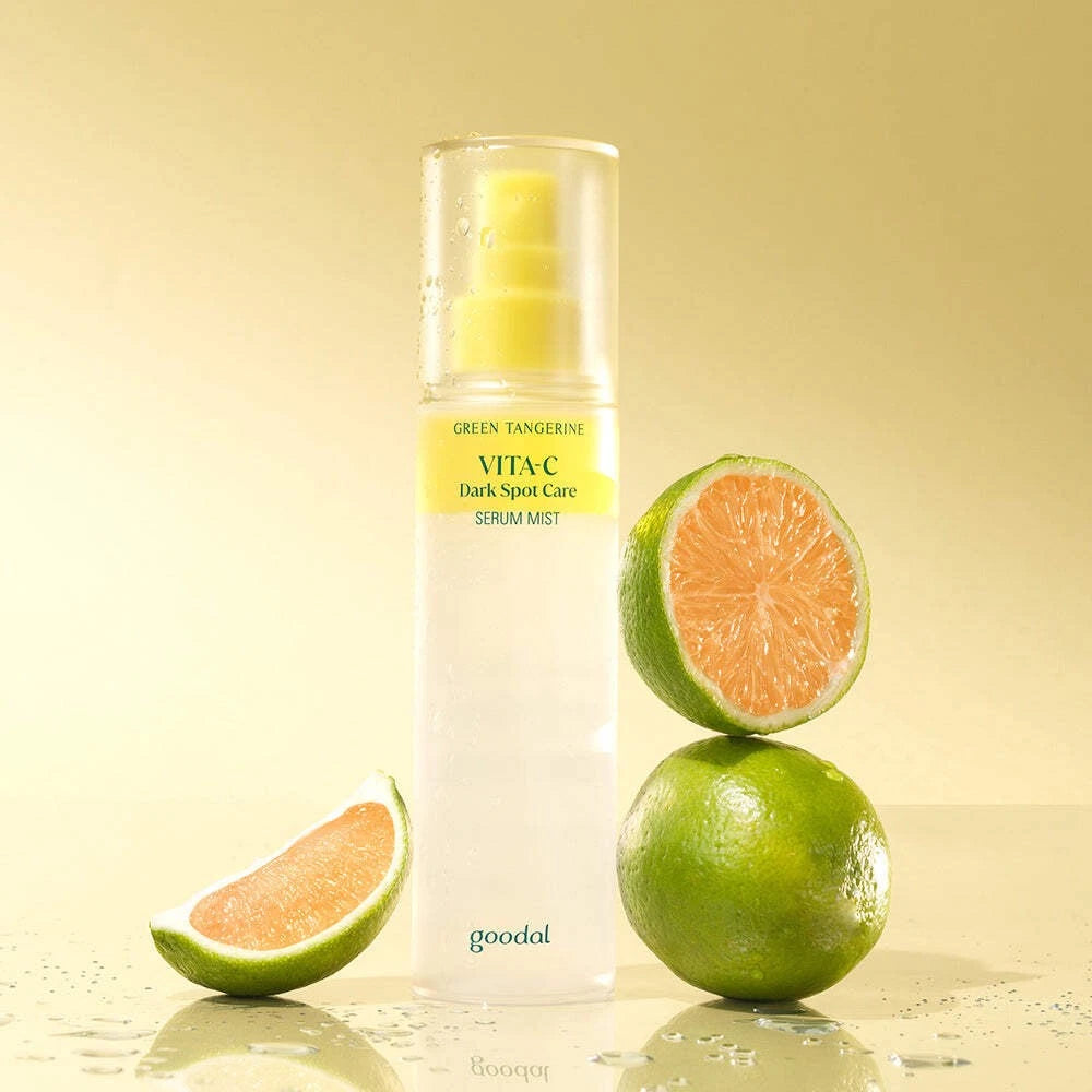goodal VITA-C Dark Spot Care Serum Mist with green tangerine slices on a yellow background