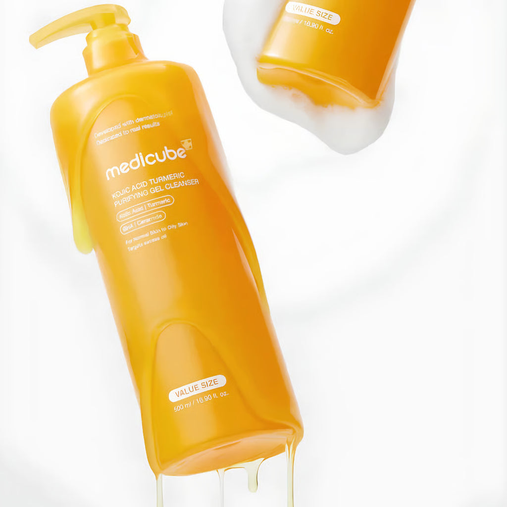 An orange-yellow pump bottle of medlcube facial cleanser on a white background, with a smaller inset showing the bottle dispensing white foam.