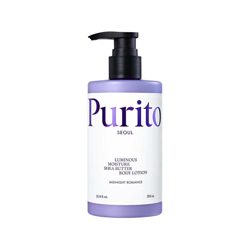 A bottle of Purito Luminous Moisture Shea Butter Body Lotion in Midnight Romance, featuring a lavender purple bottle, a white label with purple lettering, and a black pump dispenser, set against a plain white background.